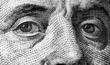 نظرية ابتسامة الدولار الأمريكي وكيف يستفيد المستثمر منها؟